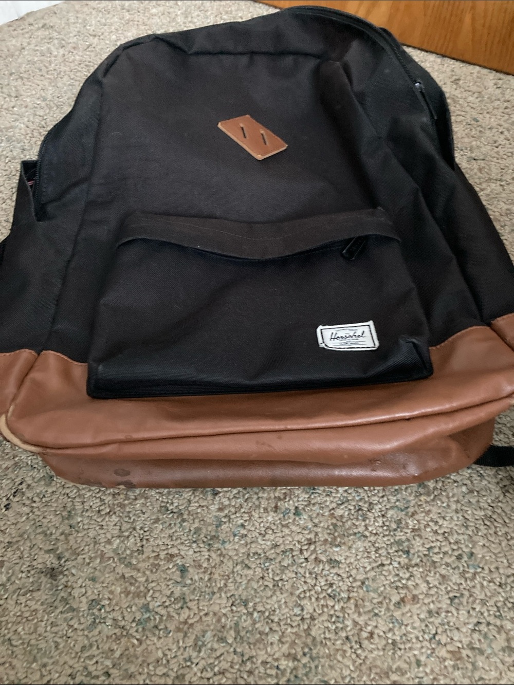 Herschel leather bottom backpack